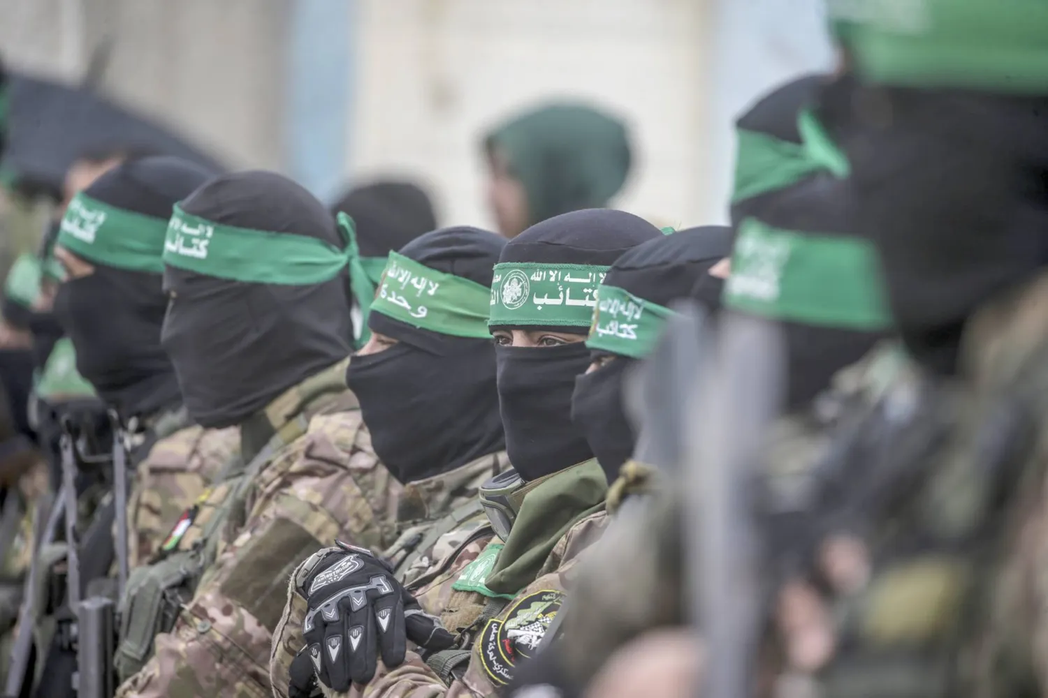 Gunmen from Hamas’ Izz ad-Din al-Qassam Brigades in Nuseirat refugee camp, central Gaza, February 2025 (EPA)