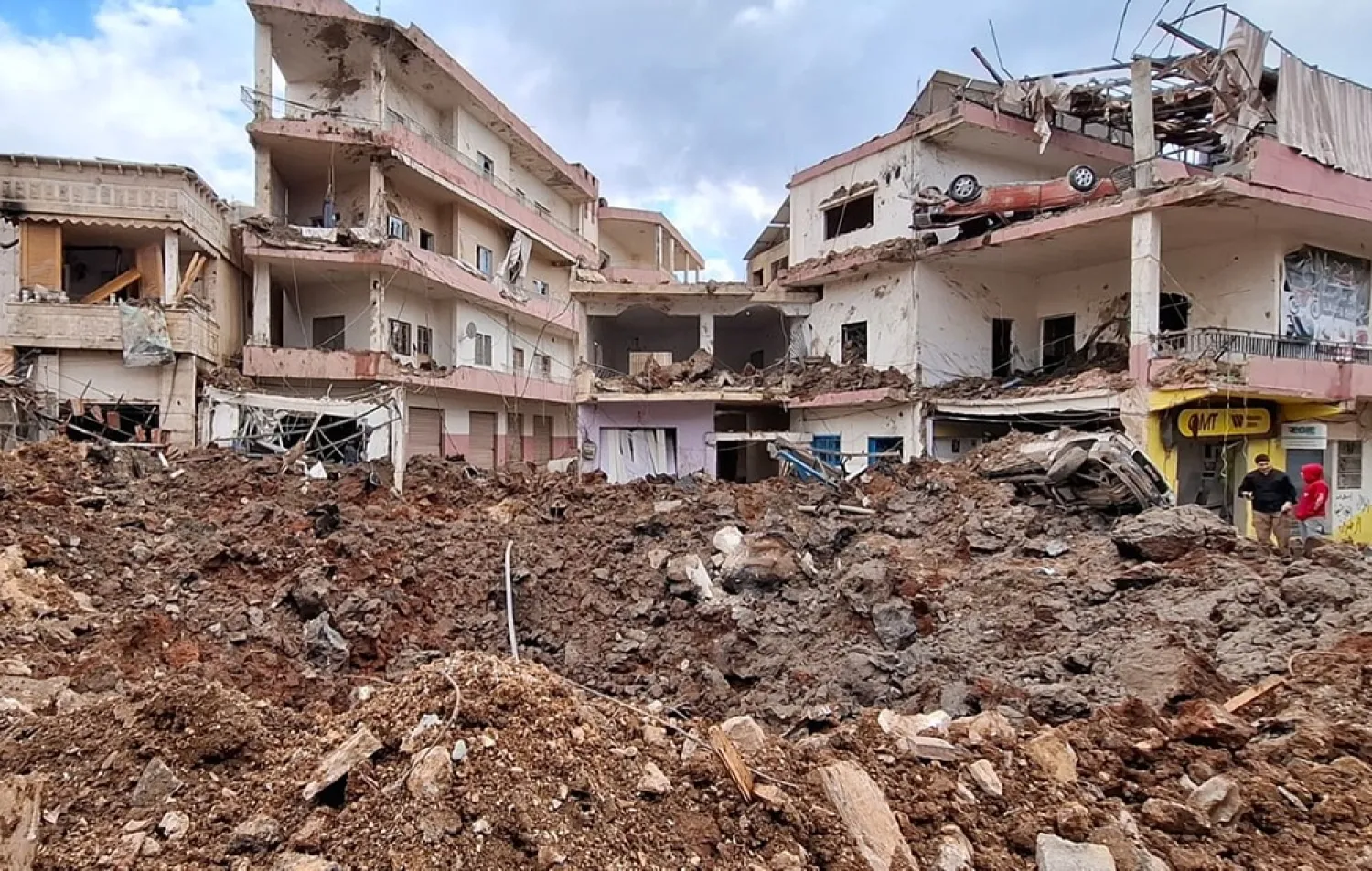 People check the damage left by Israeli airstrikes, Saturday, March 7, 2026, in the village of Nabi Sheet, eastern Lebanon late Friday, where Israeli forces landed overnight and dug a grave in a cemetery searching for Israeli co-pilot Ron Arad who was captured and then went missing after his fighter jet crashed over south Lebanon in 1986. (AP) 