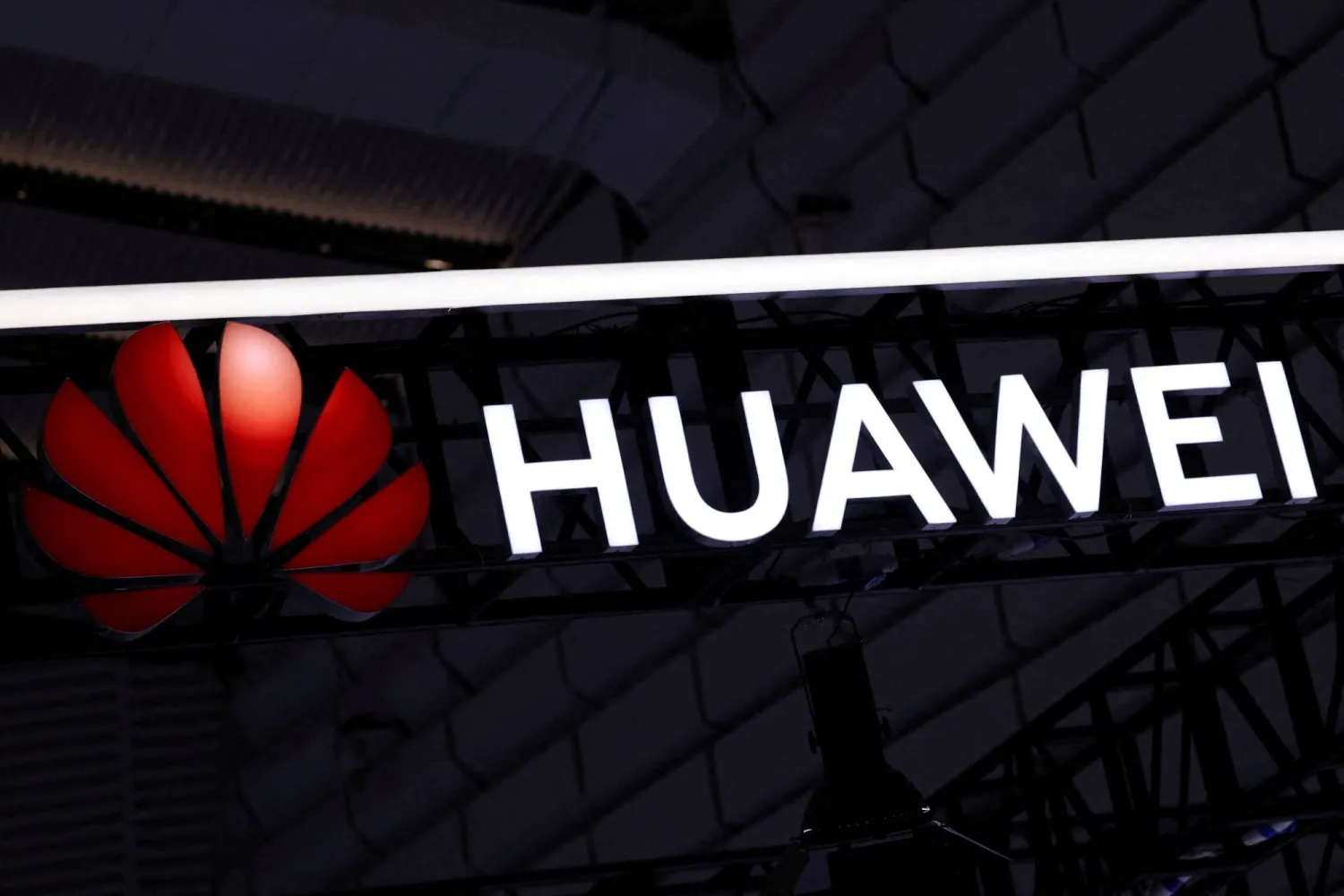 FILE PHOTO: A sign of Huawei is displayed at the company's booth at the expo of the World Internet Conference in Wuzhen town of Tongxiang city, Zhejiang province, China November 8, 2025. REUTERS/Tingshu Wang/File Photo