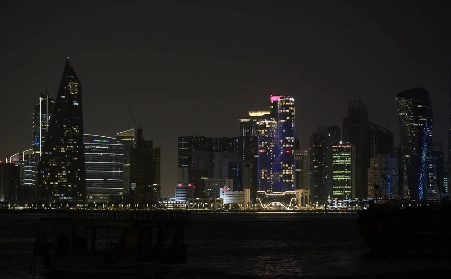28 March 2026, Qatar, Doha: A view of the West Bay skyline in Doha with its lights switched off during Earth Hour. (dpa)