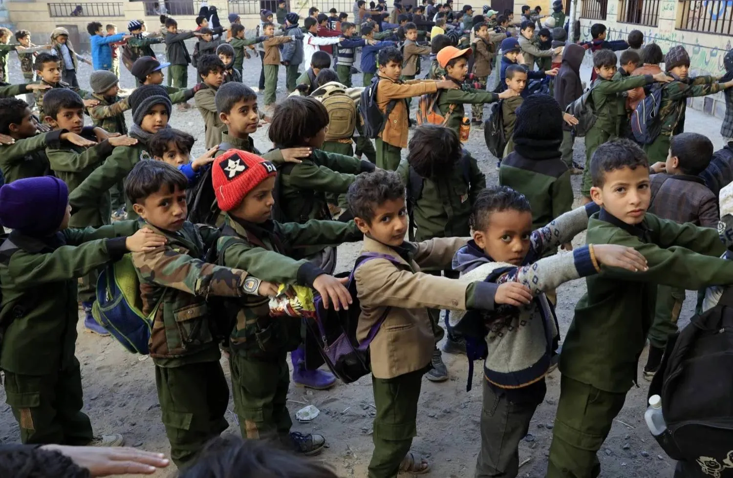 Yemeni students attend morning assembly at a school in Sanaa (EPA)