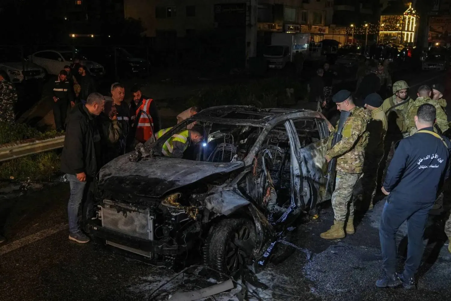 Lebanese security personnel at the site of an Israeli strike targeting senior military commander Youssef Hashem in the Jnah area on the outskirts of Beirut (Reuters). 