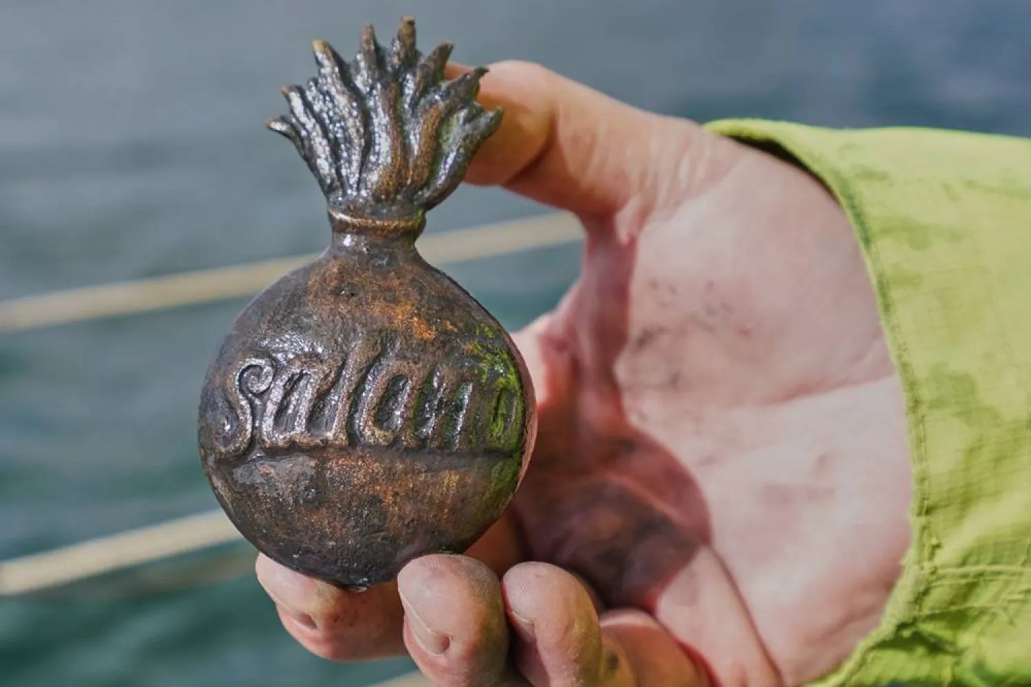  Morten Johansen, head of maritime archaeology at Denmark's Viking Ship Museum, shows a metal insignia recovered from the wreck of Danish flagship "Dannebroge" that sank during the Battle of Copenhagen in 1801, in Copenhagen, Denmark, Tuesday, March 31, 2026. (AP)
