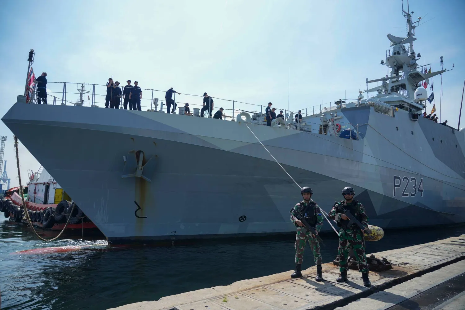 Indonesian soldiers stand guard as Royal Navy offshore patrol vessel HMS Spey is docked at Tanjung Priok Port during a port visit in Jakarta, Indonesia, Wednesday, Jan. 15, 2025. (AP Photo/Tatan Syuflana, File) 