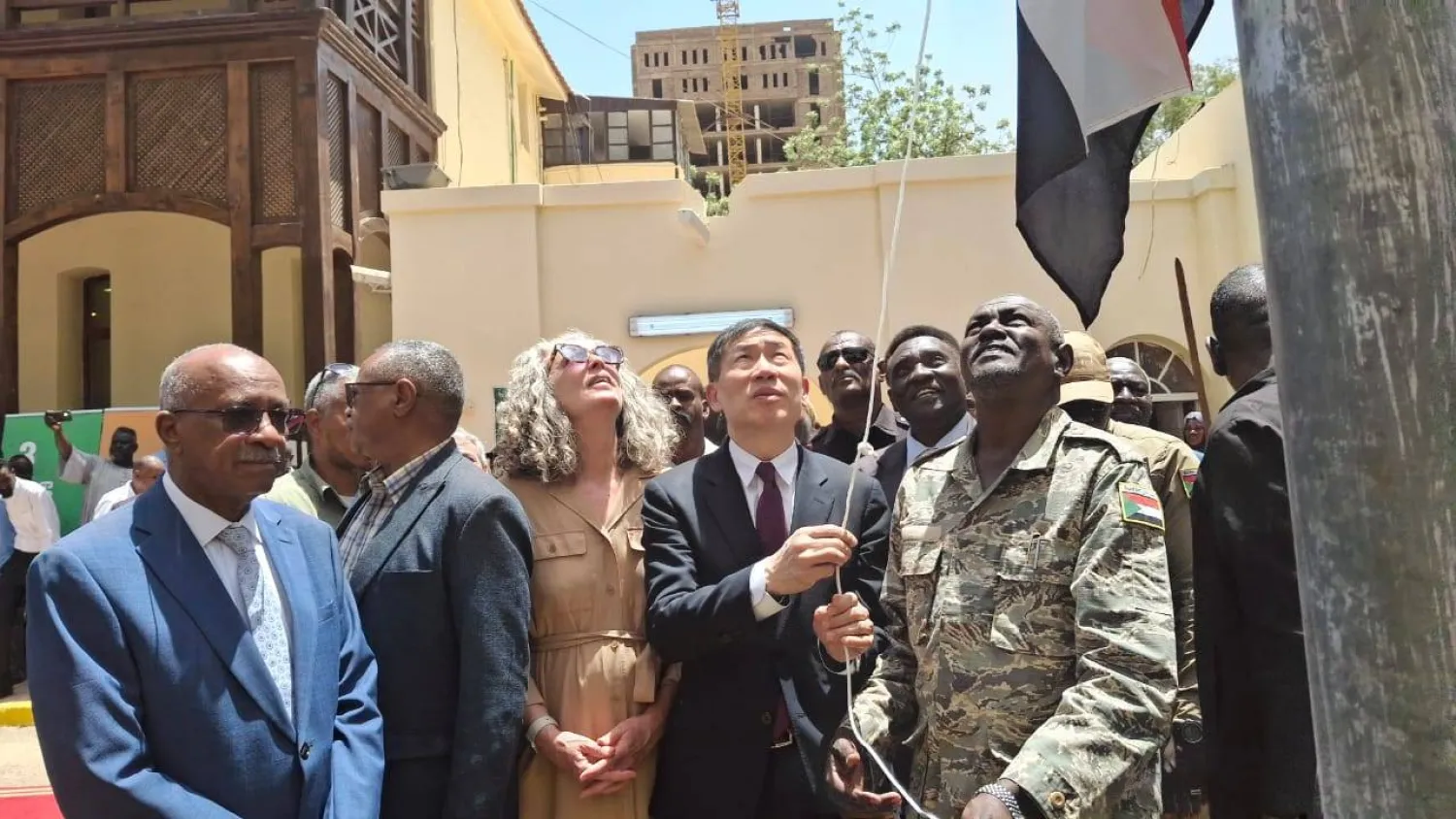 Officials are seen at the reopening ceremony in Khartoum. (Asharq Al-Awsat)
