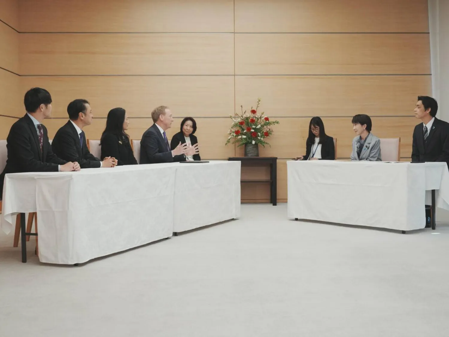Microsoft's Vice Chair and President Brad Smith (4th L) and (L-R) Sakura Internet Inc President and CEO Kunihiro Tanaka, SoftBank Corp. President and CEO Junichi Miyakawa, Microsoft Japan President Miki Tsusaka, hold a meeitng with Japan's Prime Minister Sanae Takaichi (2nd R) and Vice Minister of Economy, Trade and Industry Toshiro Ino (R) at the Prime Minister's Office in Tokyo on April 3, 2026. Kazuhiro NOGI / POOL/AFP
