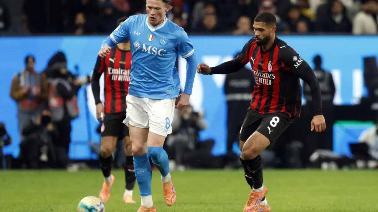 Napoli and AC Milan will be looking to close the gap on Serie A leaders Inter Milan. Fayez Nureldine / AFP/File
