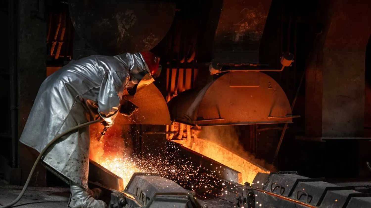 Smelter workers process copper at the Glogow plant in southwestern Poland, owned by KGHM. Wojtek RADWANSKI / AFP
