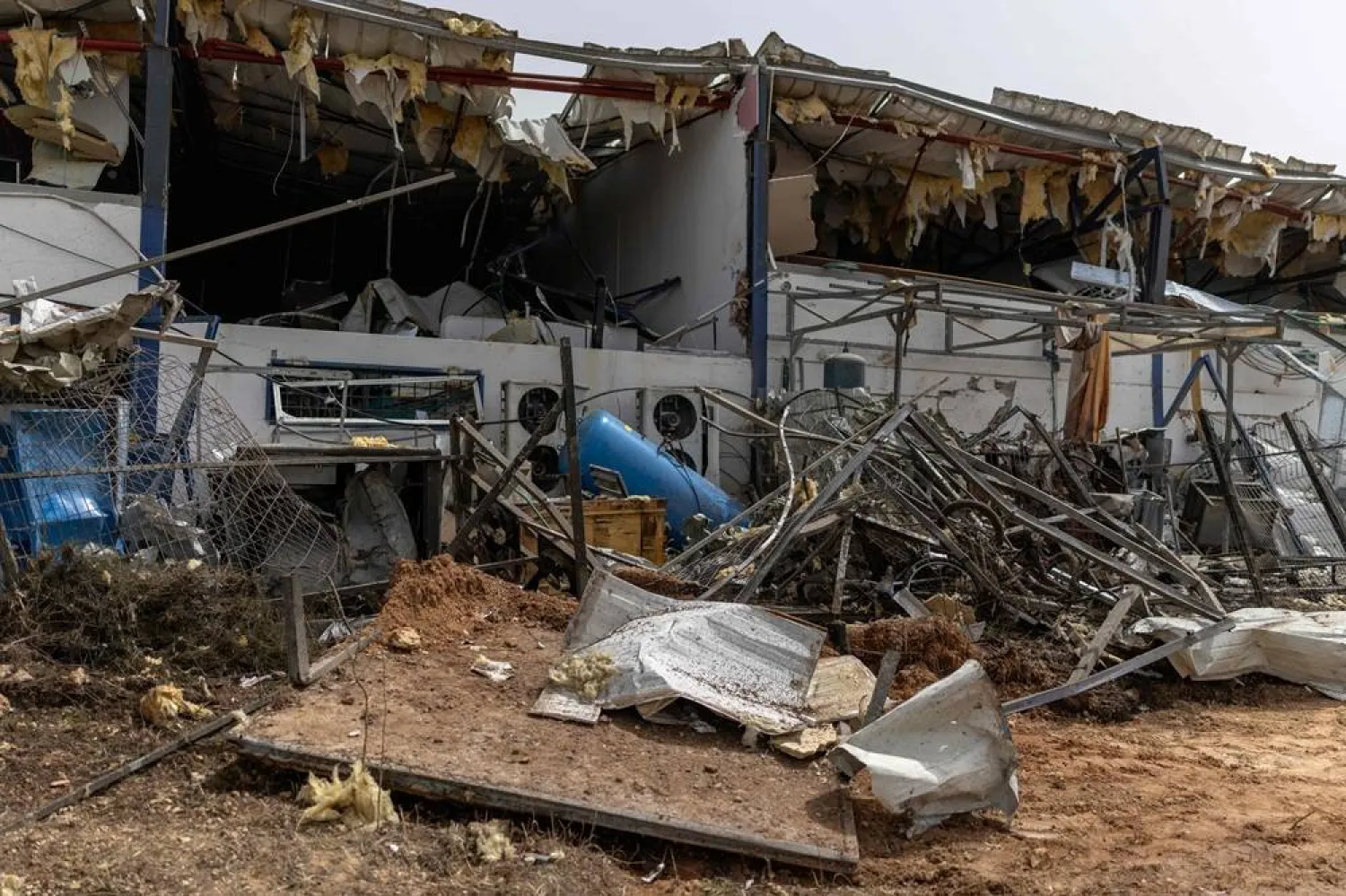 A picture shows the damage at a factory that got hit by a missile in Petah Tikva, east of Tel Aviv, on April 3, 2026. (AFP)