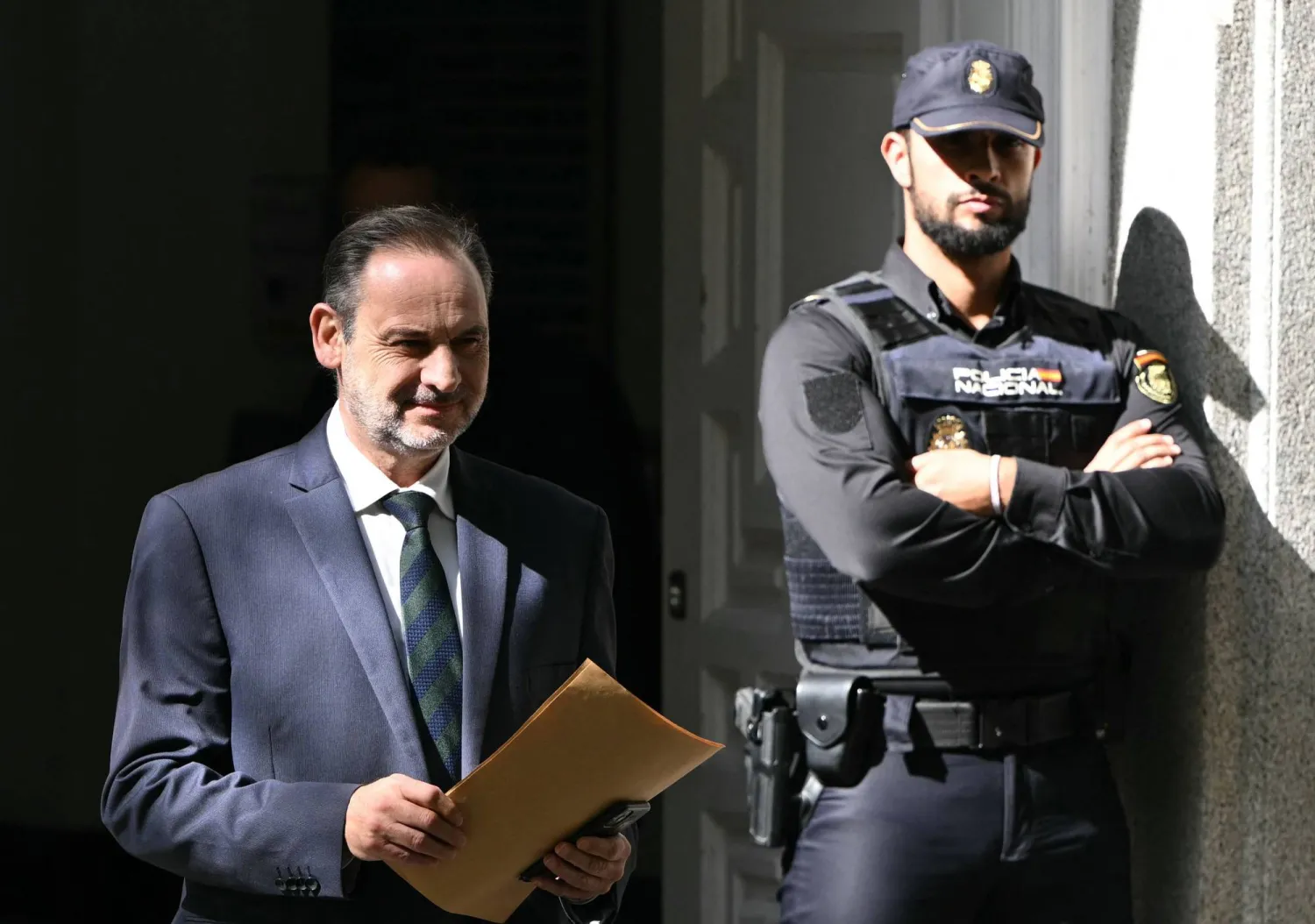 Former Spanish Minister of Transport Jose Luis Abalos leaves the Supreme Court following his appearance for alleged corruption in Madrid on October 15, 2025. (AFP)