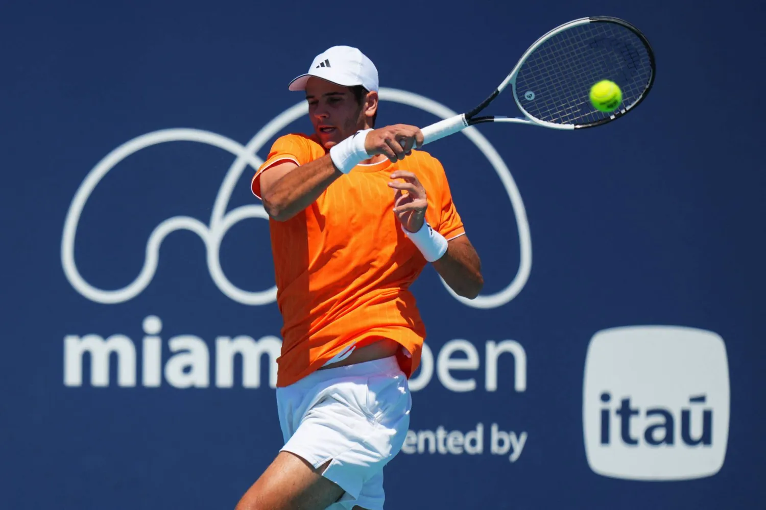 MIAMI GARDENS, FLORIDA - MARCH 22: Rafael Jodar of Spain returns a shot against Tomas Martin Etcheverry of Argentina during Day 6 of the Miami Open at Hard Rock Stadium on March 22, 2026 in Miami Gardens, Florida. Rich Storry/Getty Images/AFP