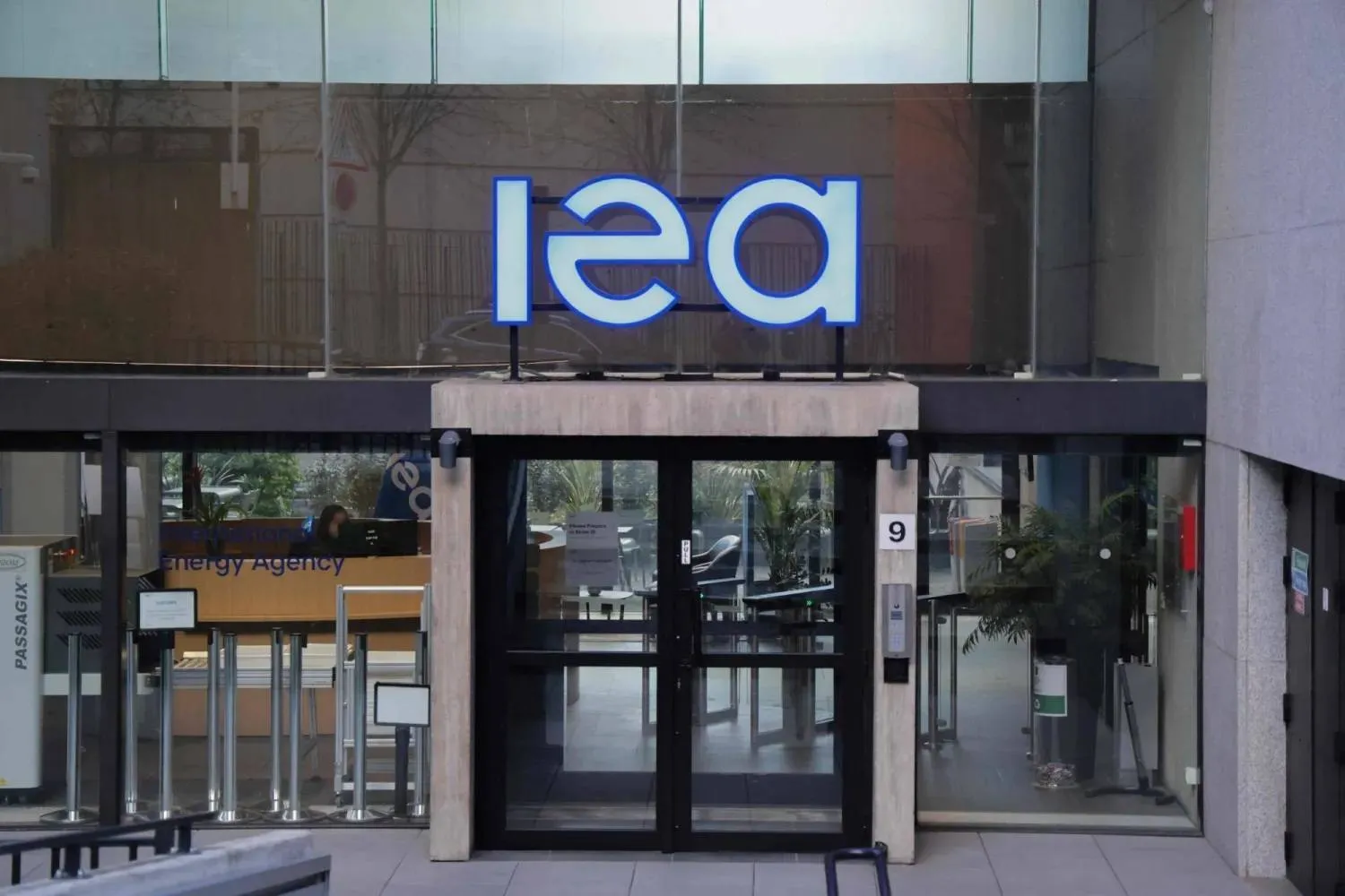 This photograph shows the entrance to the International Energy Agency (IEA) headquarters in Paris on March 11, 2026. (AFP)