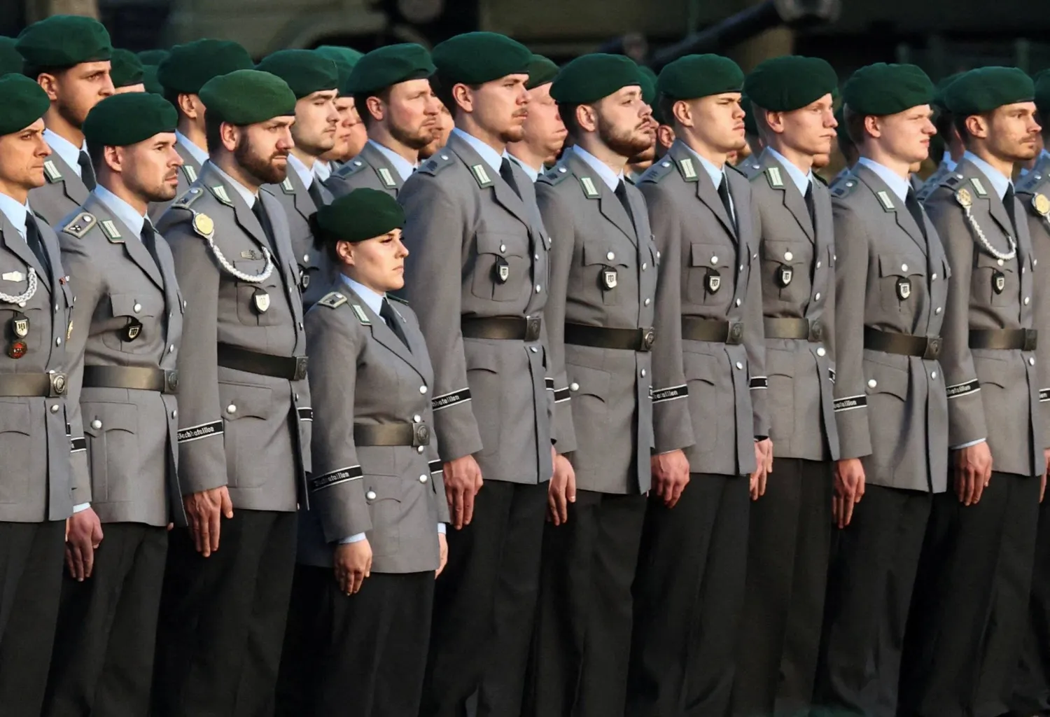 Soldiers of the Guard Battalion of the German army Bundeswehr stand in position on the day German Chancellor Friedrich Merz presents the Chancellor's Ribbon of Honour to the Guard Battalion, which is responsible for protocol duties and the protection of the German government, at the Federal Defense Ministry in Berlin, Germany, March 23, 2026. (Reuters) 