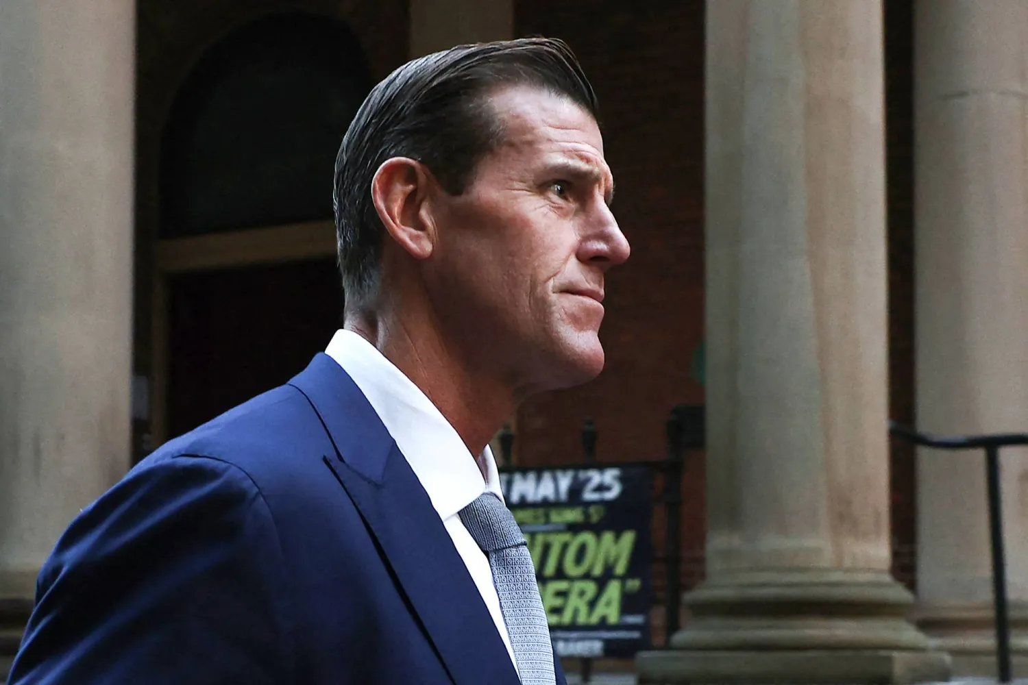 (FILES) A file photo taken on May 1, 2025 shows former member of Australia's elite Special Air Service regiment Ben Roberts-Smith leaving the Federal Court in Sydney. (Photo by Saeed KHAN / AFP)