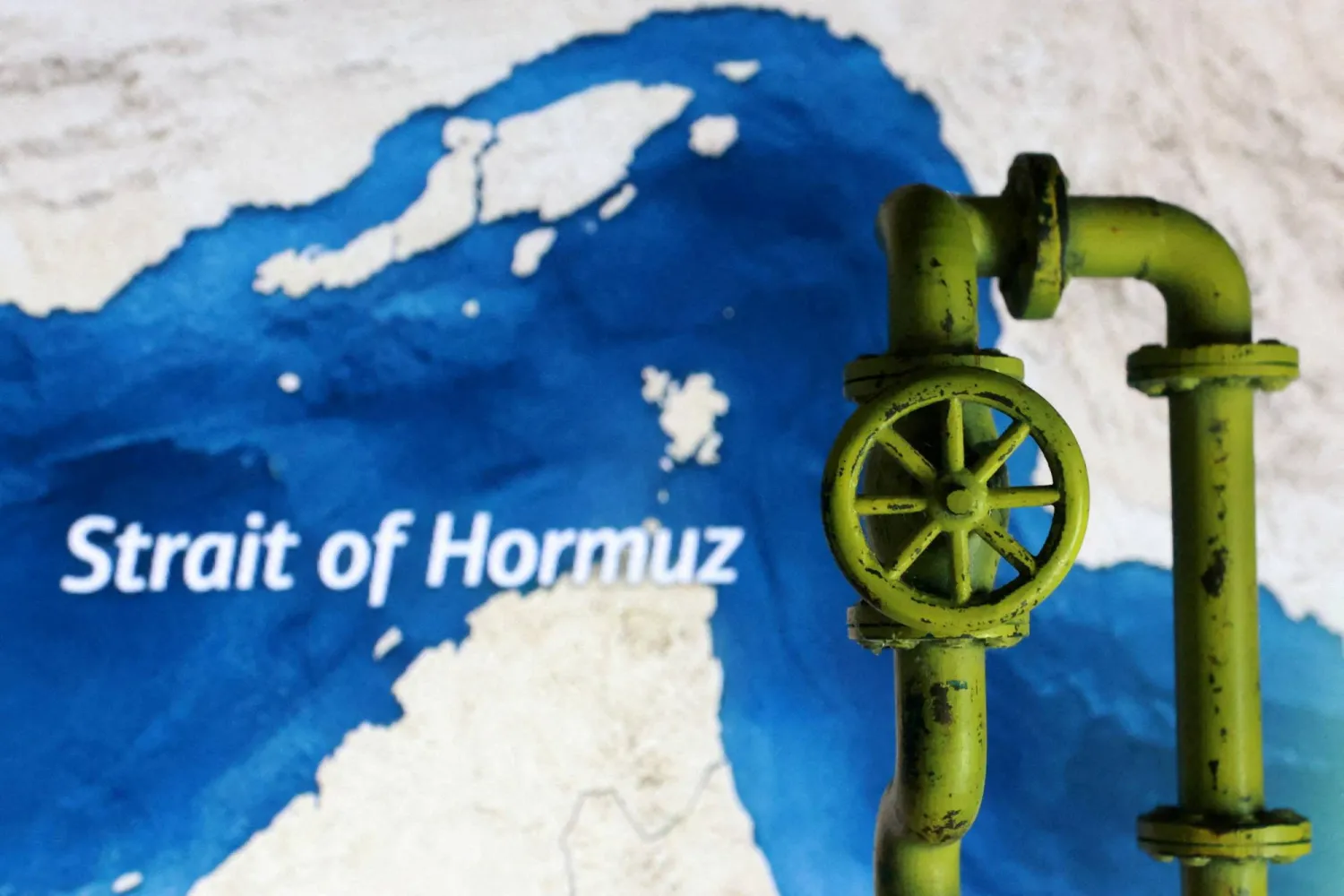 FILE PHOTO: A map showing the Strait of Hormuz and a 3D printed oil pipeline are seen in this illustration taken March 23, 2026. REUTERS/Dado Ruvic/Illustration/File Photo/File Photo
