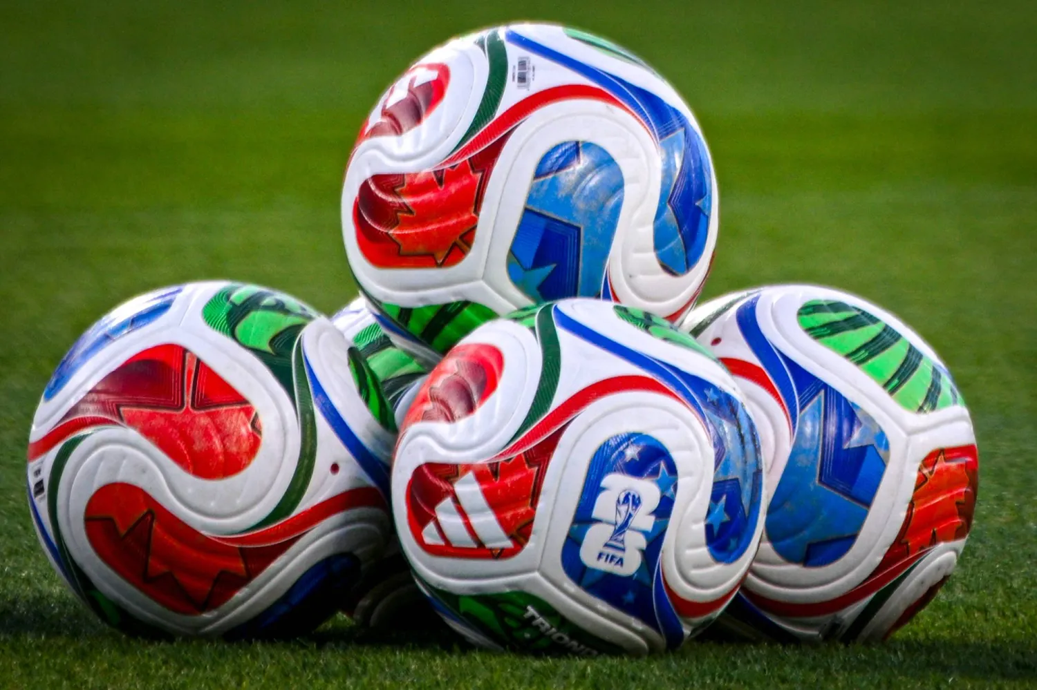  FIFA game balls are seen on the field ahead of a friendly football match between Brazil and Croatia at Camping World Stadium in Orlando, Florida, on March 31, 2026. (AFP)