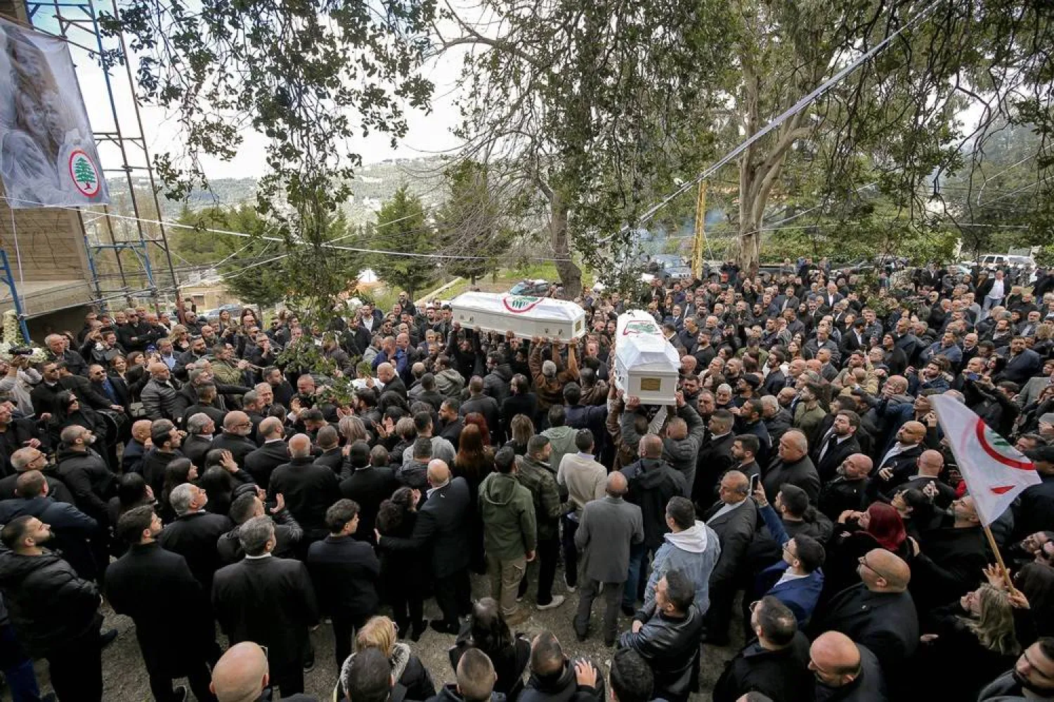 07 April 2026, Lebanon, Yahshoush: Mourners carry the coffins of Lebanese Forces official Pierre Mouawad and his wife during their funeral procession in the village of Yahshoush, northeast of Beirut. (dpa)