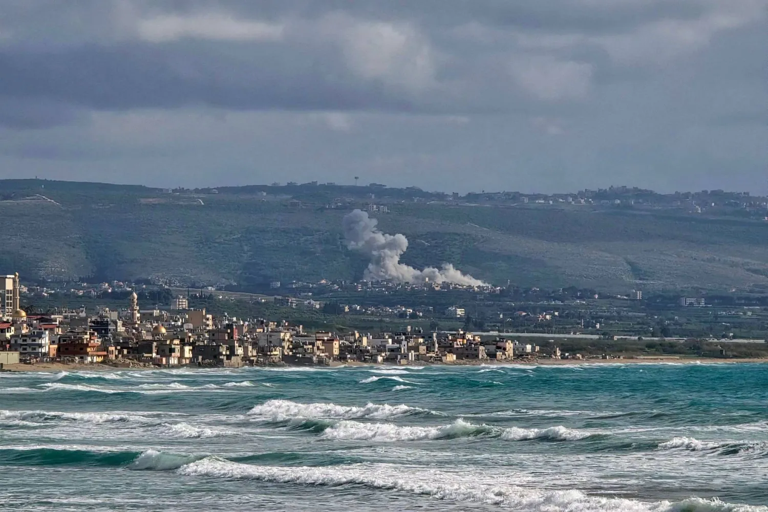 This photograph taken from the southern Lebanese area of Tyre shows smoke rising from the site of an Israeli strike in Hanniyeh village of Lebanon, on April 5, 2026. (AFP)