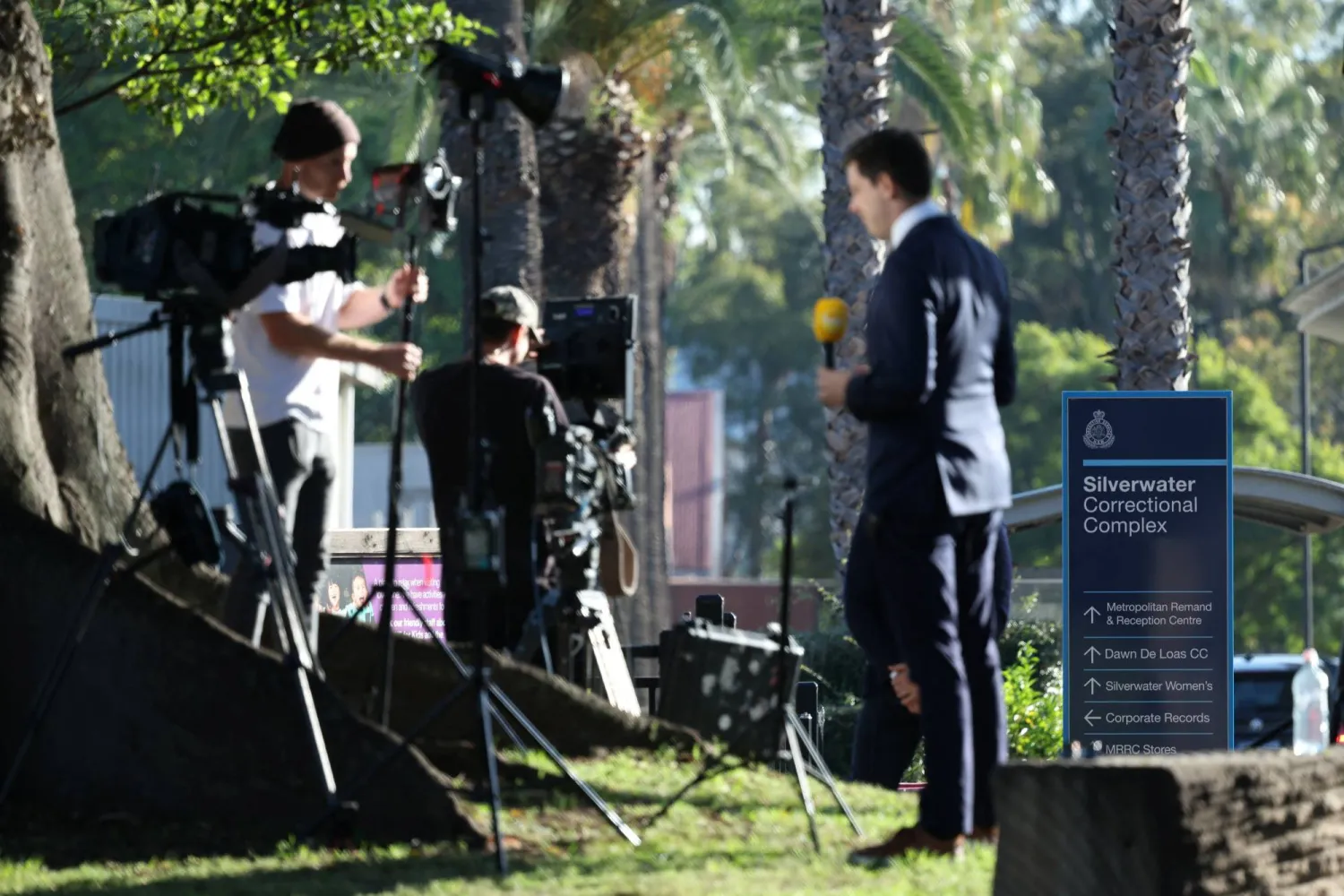 Media wait outside Silverwater Correctional Complex after former Australian Defence Force soldier Ben Roberts-Smith was charged with alleged war crimes committed in Afghanistan, in Sydney, Australia, April 8, 2026. REUTERS/Hollie Adams