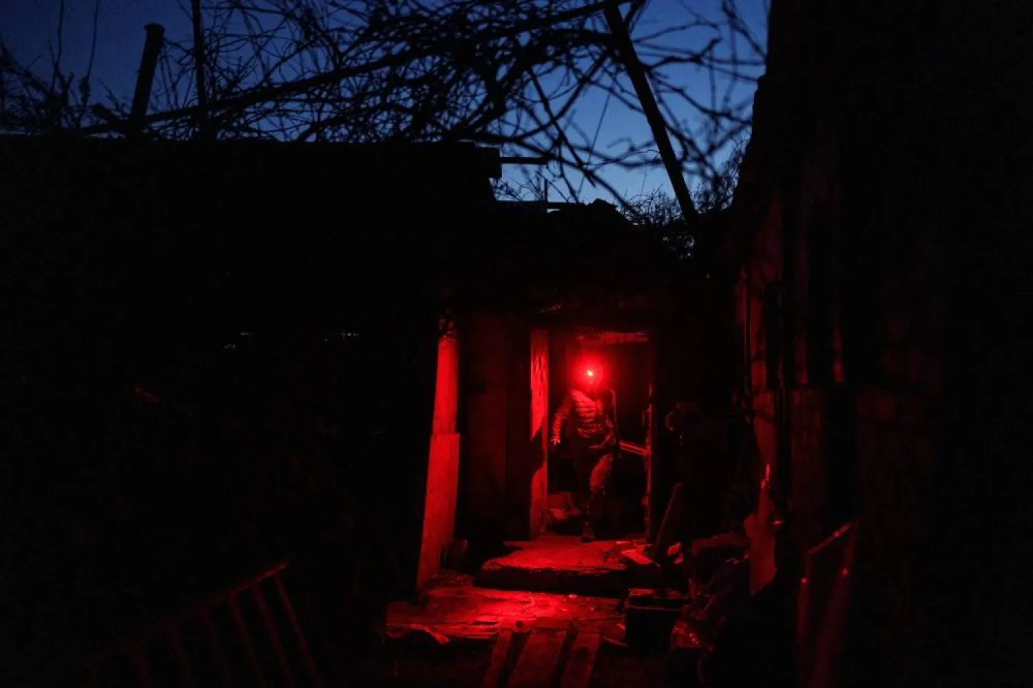 Service members of the 154th Separate Mechanized Brigade of the Ukrainian Armed Forces carry ammo before delivering it to a position of their brothers-in-arms, amid Russia's attack on Ukraine, near a front line in Zaporizhzhia region, Ukraine April 6, 2026. (Reuters)