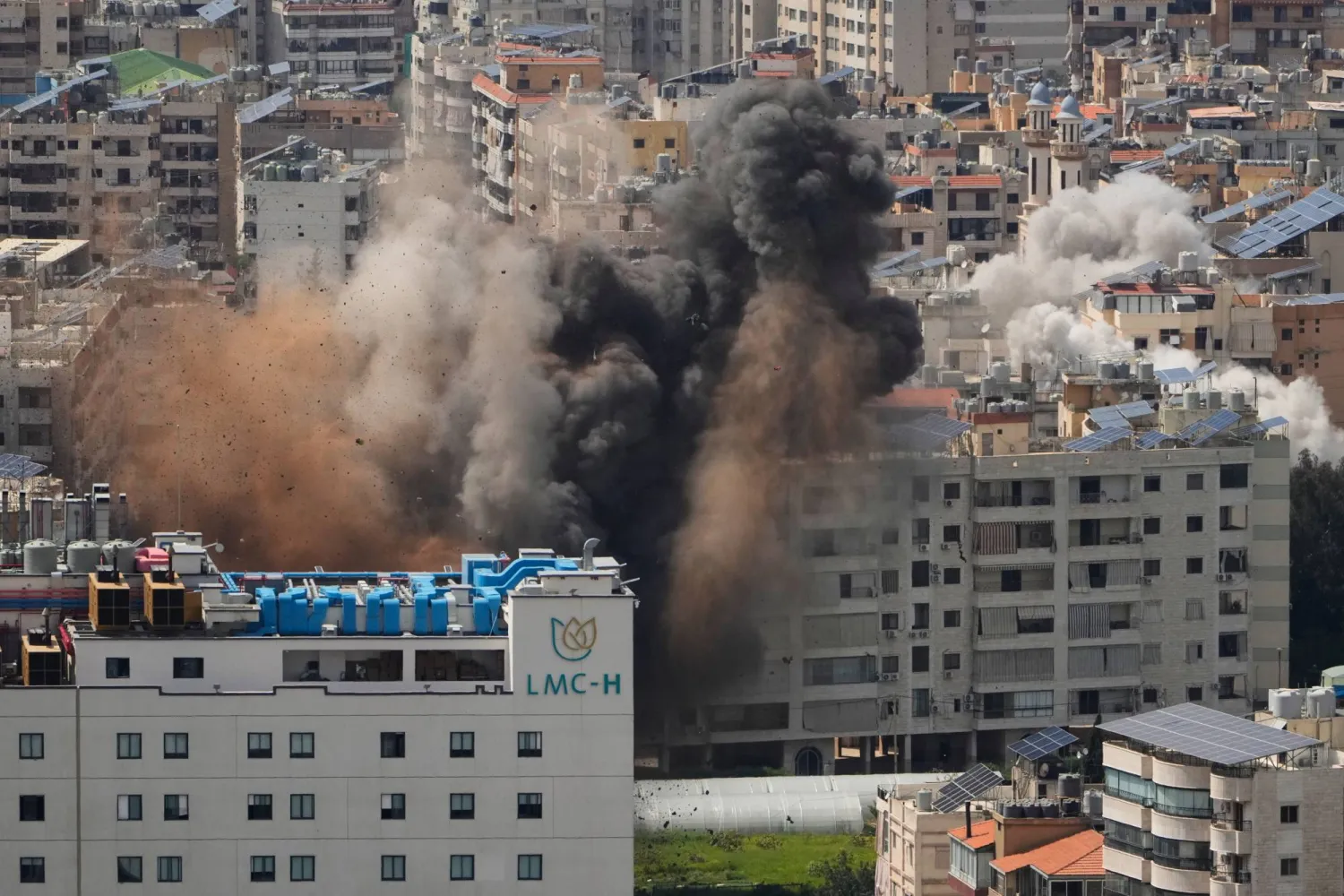 Smoke rises following several Israeli airstrikes in Beirut, Lebanon, Wednesday, April 8, 2026. (AP Photo/Hassan Ammar)
