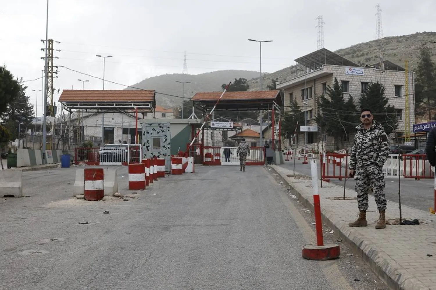 Lebanese General Security members stand guard at the Masnaa border crossing with Syria in the Bekaa Valley, eastern Lebanon, 05 April 2026, (EPA)