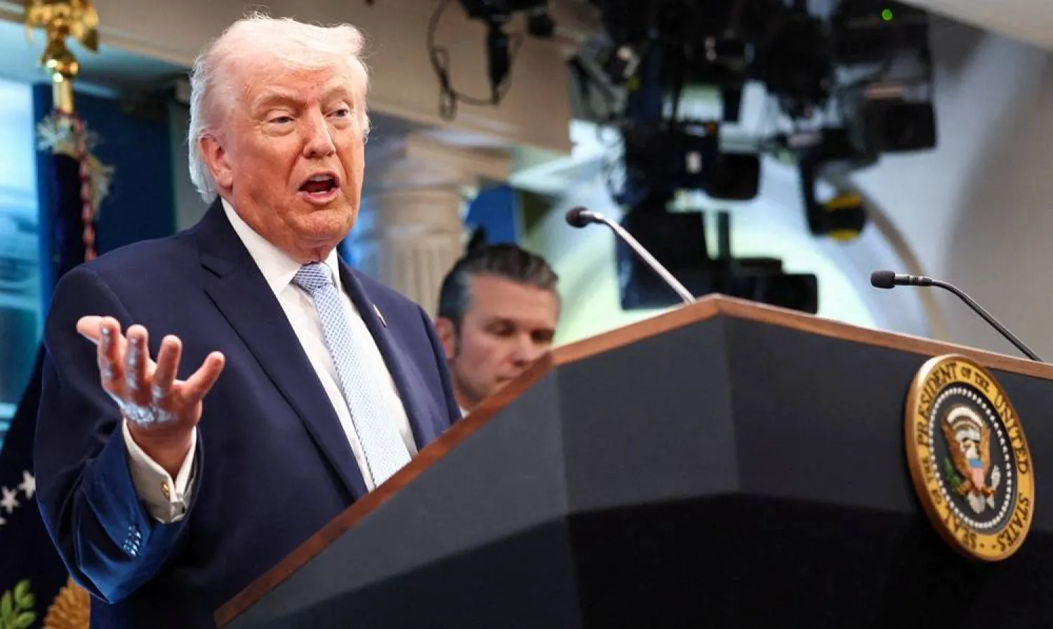 US President Donald Trump, flanked by Secretary of Defense Pete Hegseth, speaks during a press conference in the James S. Brady Press Briefing Room at the White House in Washington, DC, US, April 6, 2026. (Reuters)