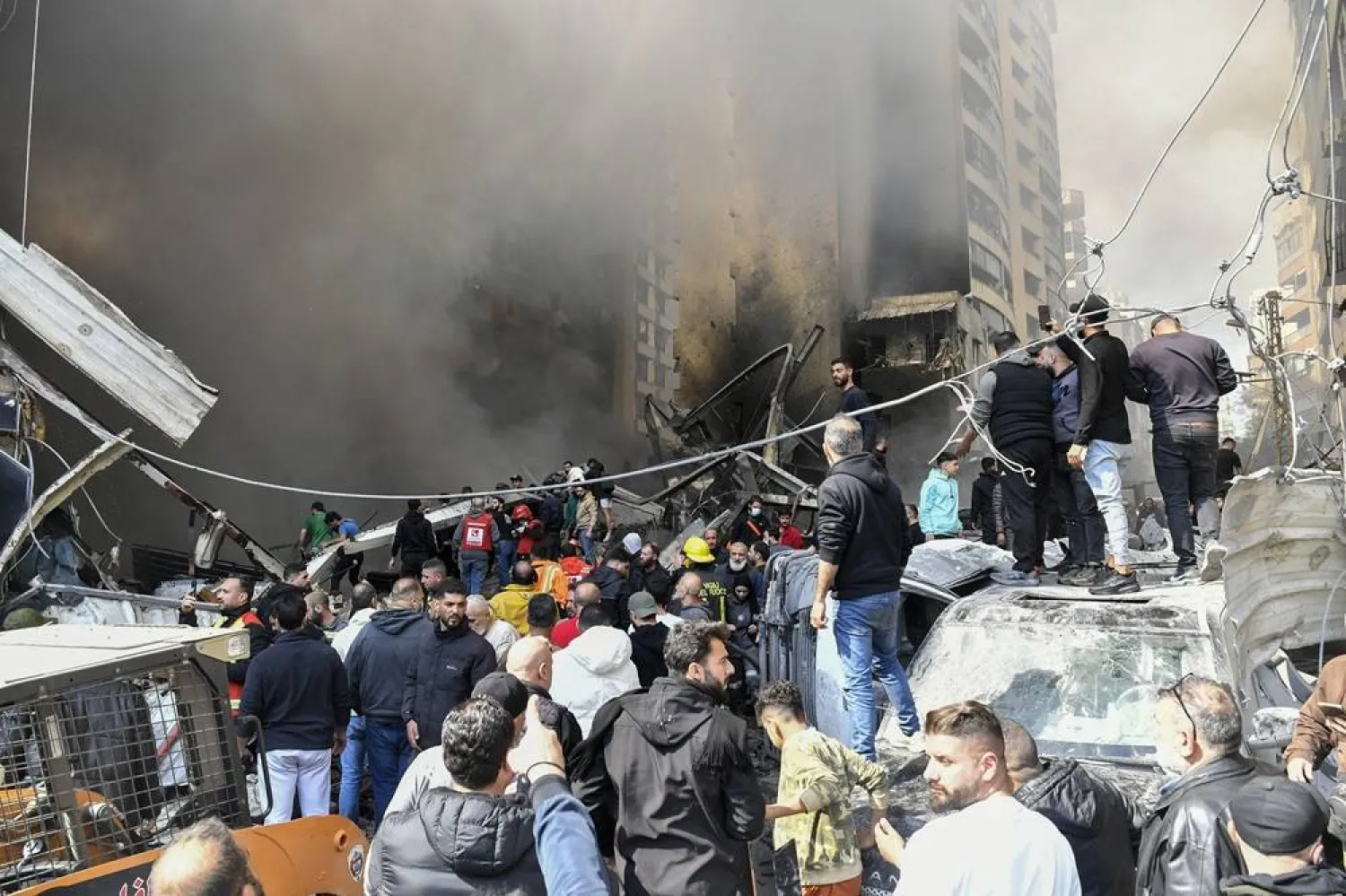 People gather at the scene of an Israeli airstrike in the Corniche al-Mazraa neighborhood of Beirut, Lebanon 08 April 2026. (EPA)