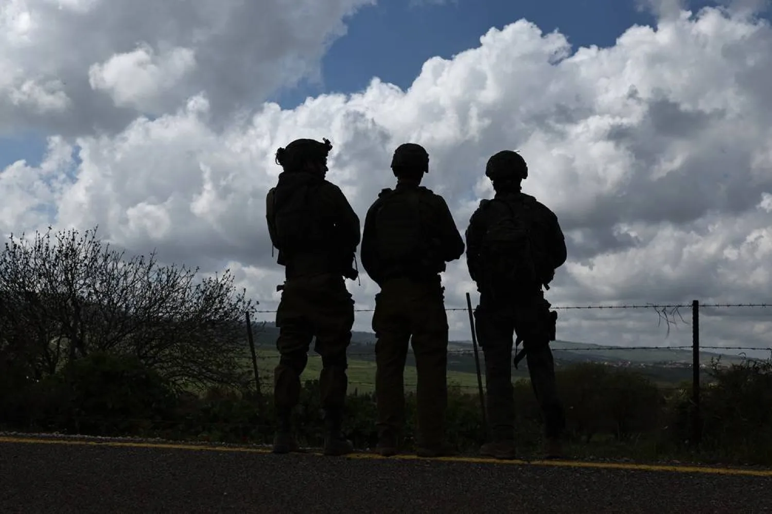 Israeli soldiers on the border with the southern Lebanon village of Bint Jbeil, seen from the Israeli side of the border on 10 April 2026, as the Israeli military continues its targeting operations in southern Lebanon. (EPA)