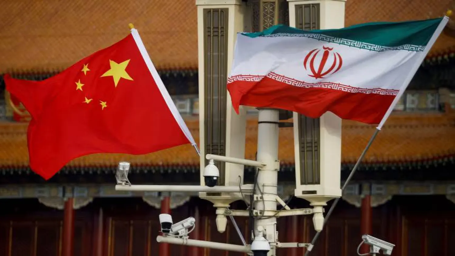 Chinese and Iranian flags raised in Tiananmen Square, Beijing - February 14, 2023 (File - Reuters)