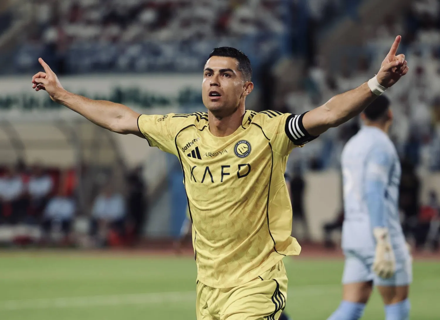 رونالدو محتفلاً بهدفه في الأخدود (موقع نادي النصر)