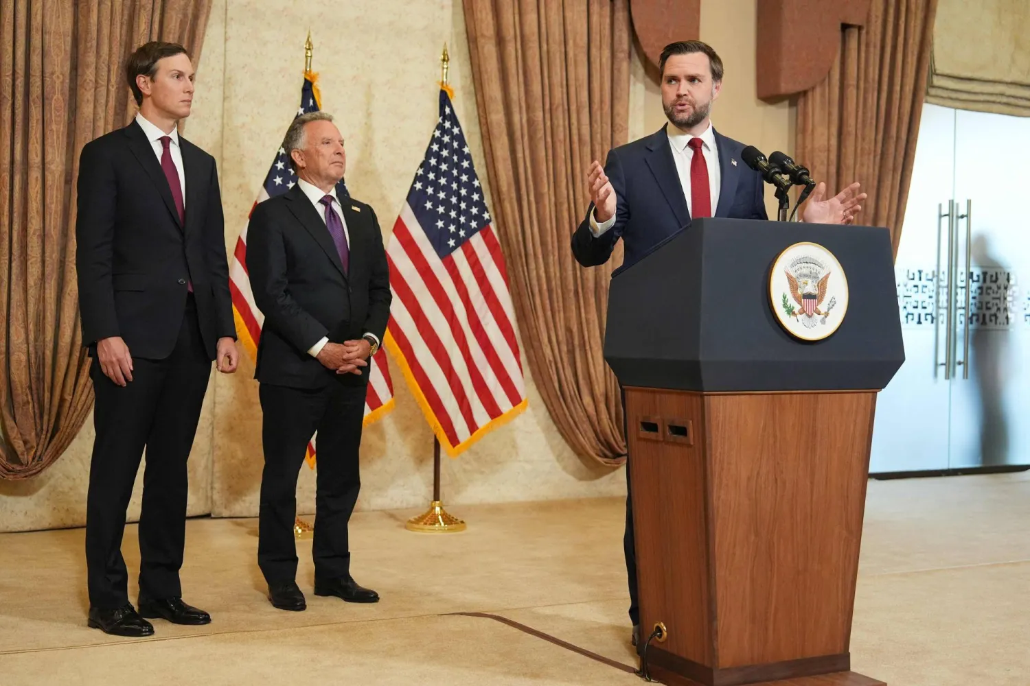 Vice President JD Vance (R) speaks during a news conference after meeting with representatives from Pakistan and Iran, as US President Donald Trump's son-in-law Jared Kushner (L) and US Special Envoy to the Middle East Steve Witkoff (C) watch, in Islamabad on April 12, 2026. (Photo by Jacquelyn MARTIN / POOL / AFP)