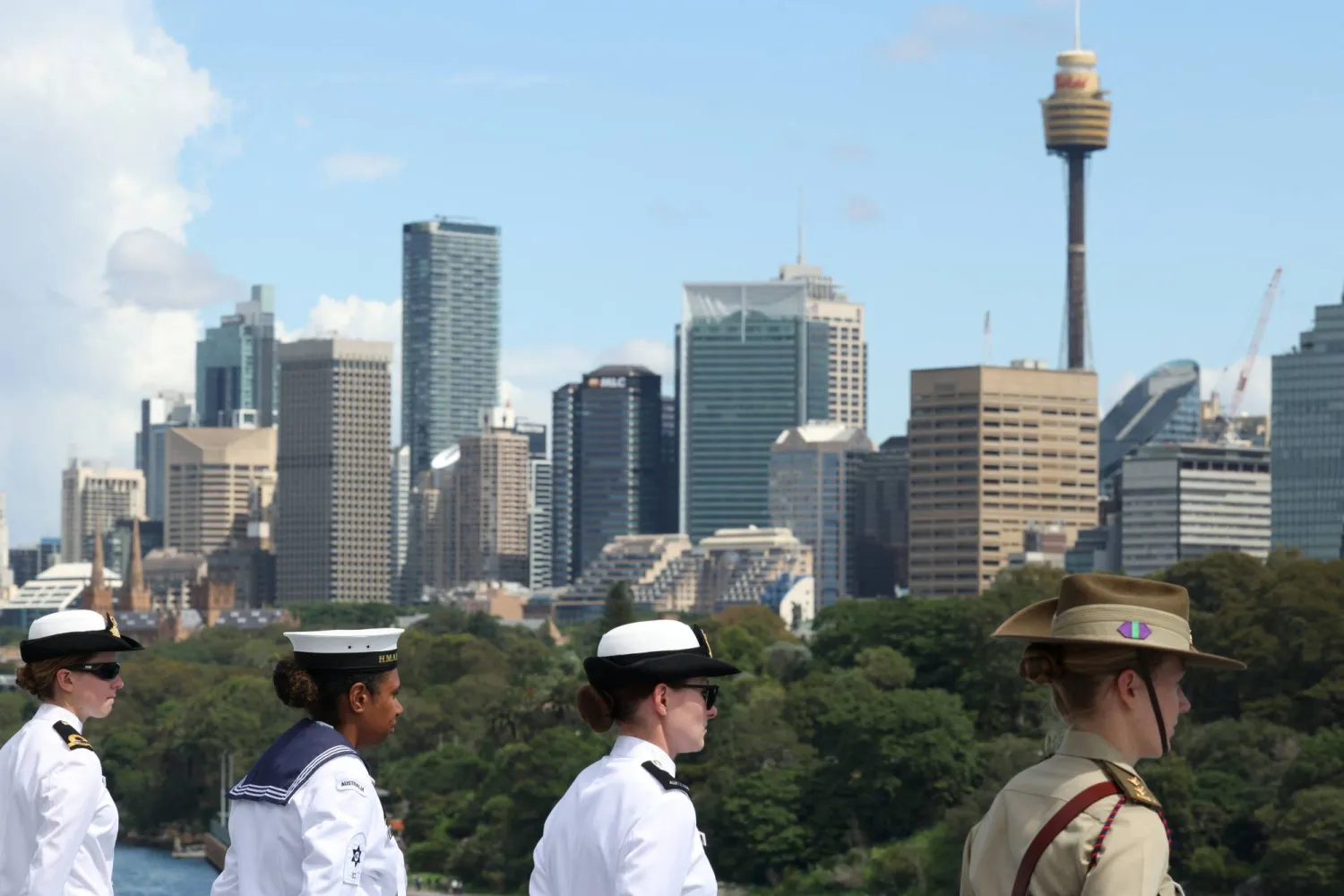 Australian servicemen stand on HMAS Canberra, ahead of the Kakadu International Fleet Review, a biennial maritime exercise marking 125 years of the Australian Navy, in Sydney, Australia, March 21, 2026. REUTERS/Hollie Adams