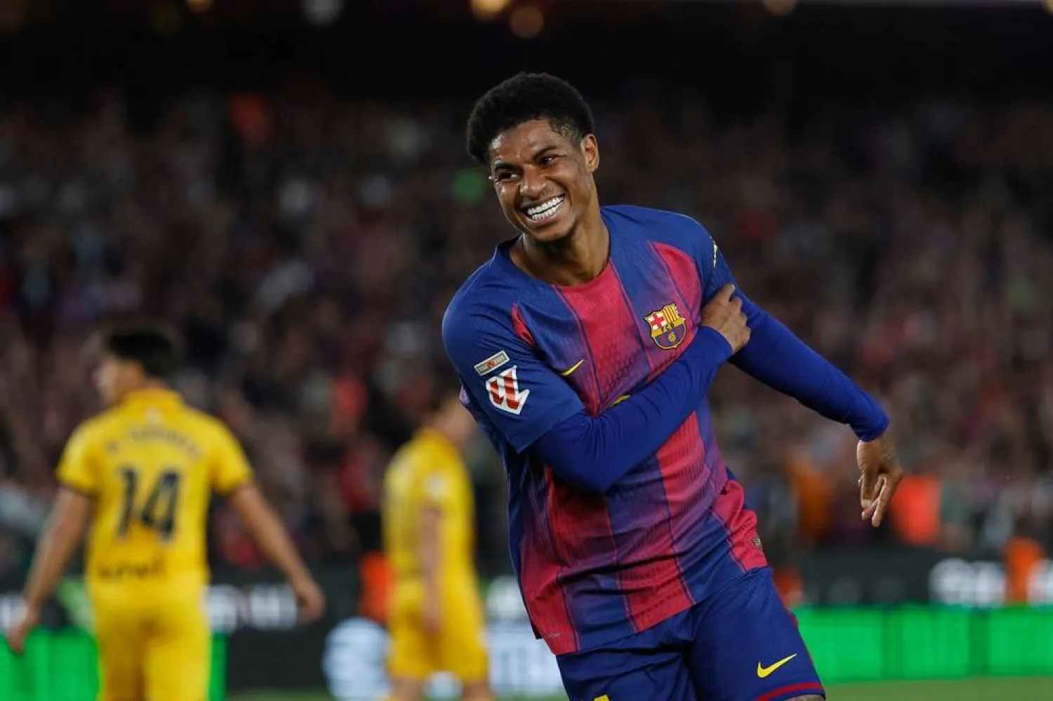  Barcelona's Marcus Rashford celebrates after scoring his side's fourth goal during the Spanish La Liga match between Barcelona and Espanyol in Barcelona, Spain, Saturday, April 11, 2026. (AP) 