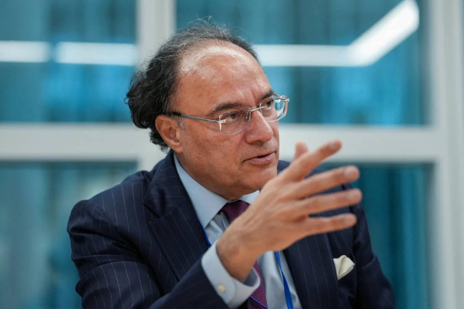 Pakistan Finance Minister Muhammad Aurangzeb speaks during an interview at the International Monetary Fund and World Bank Group’s annual spring meetings in Washington D.C., US, April 13, 2026. REUTERS/Ken Cedeno