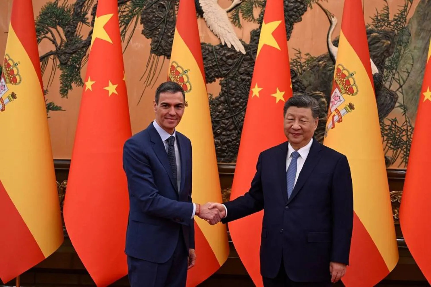 Chinese President Xi Jinping and Spain's Prime Minister Pedro Sanchez shake hands at the Great Hall of the People in Beijing, China April 14, 2026. (Spanish Government/Handout via Reuters) 