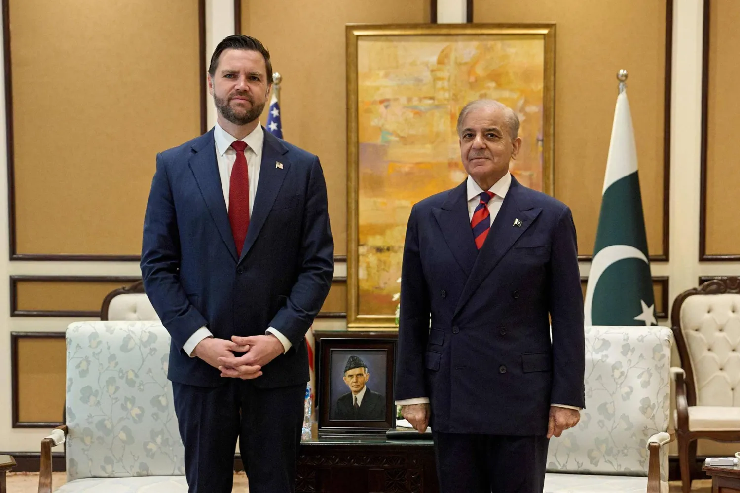 US Vice President JD Vance (L) is welcomed by Pakistani Prime Minister Shehbaz Sharif ahead of their meeting on Iran  amid the US-Iran peace talks in Islamabad on April 11, 2026. (AFP)