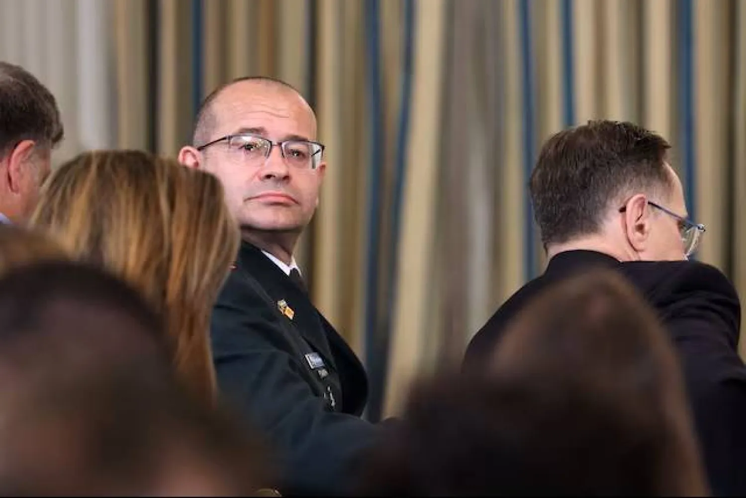 رومان غوفمان يحضر مؤتمراً صحافياً لترمب ونتنياهو في البيت الأبيض العام الماضي (رويترز)