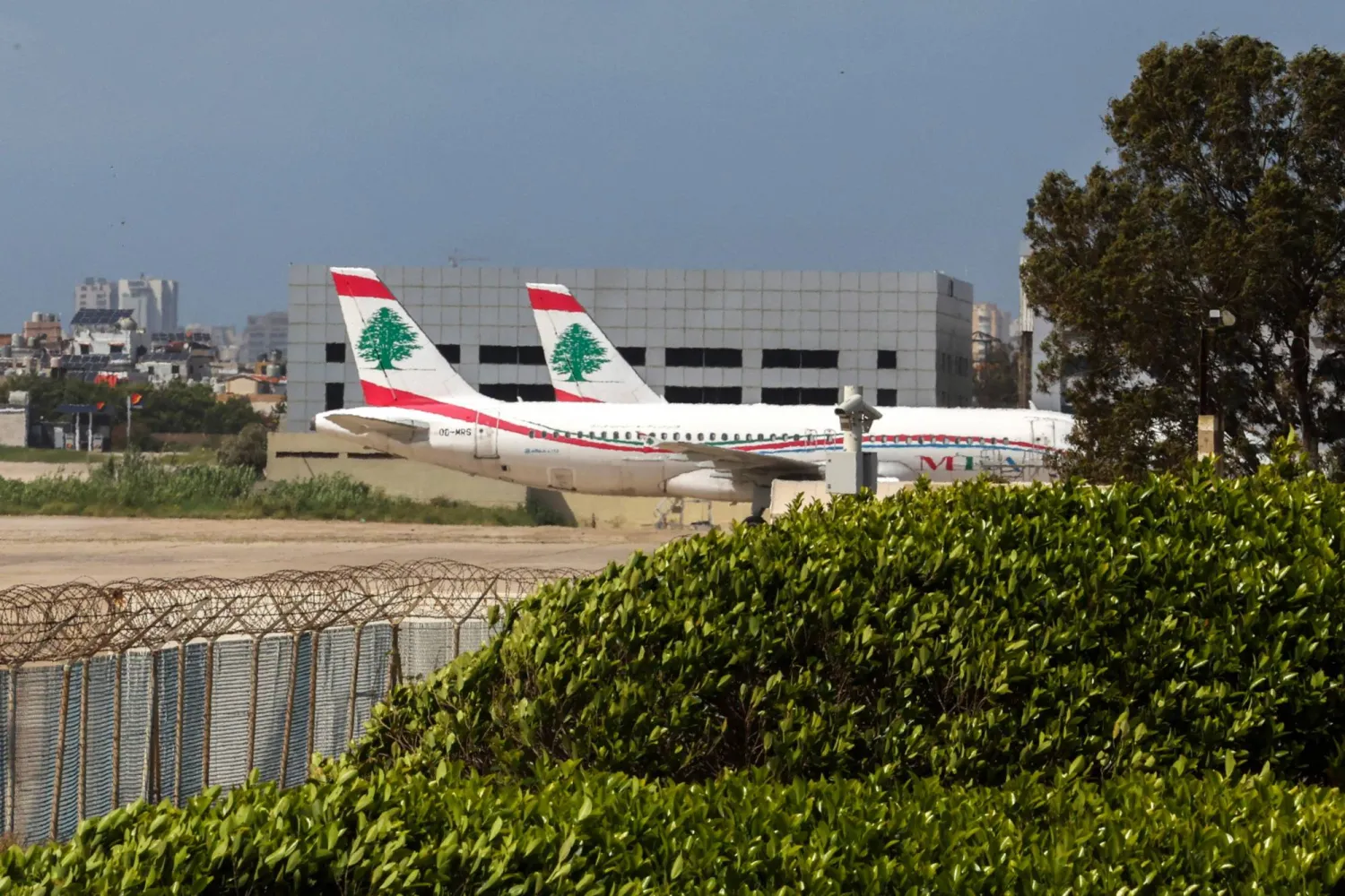 Middle East Airlines aircraft sit on the tarmac at Beirut's Rafic Hariri airport on April 10, 2026. (AFP)