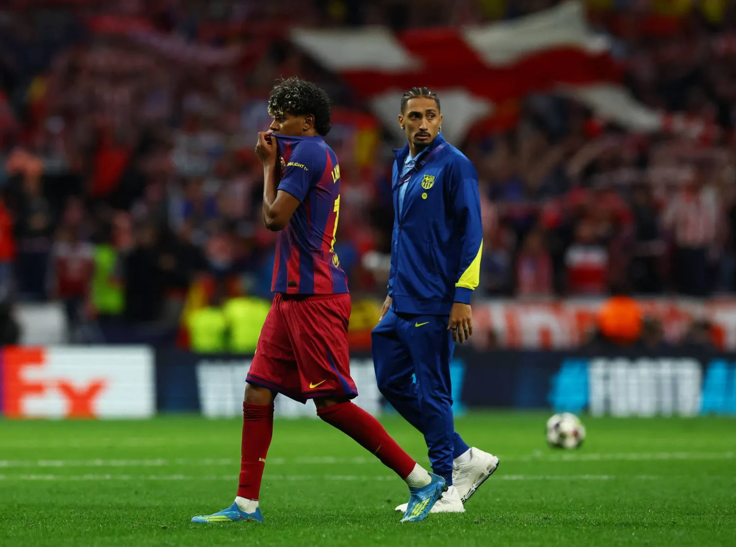 Football - UEFA Champions League - Quarter-Final - Second Leg - Atletico Madrid v FC Barcelona - Riyadh Air Metropolitano, Madrid, Spain - April 14, 2026 FC Barcelona's Lamine Yamal and Raphinha look dejected after the match. (Reuters) 