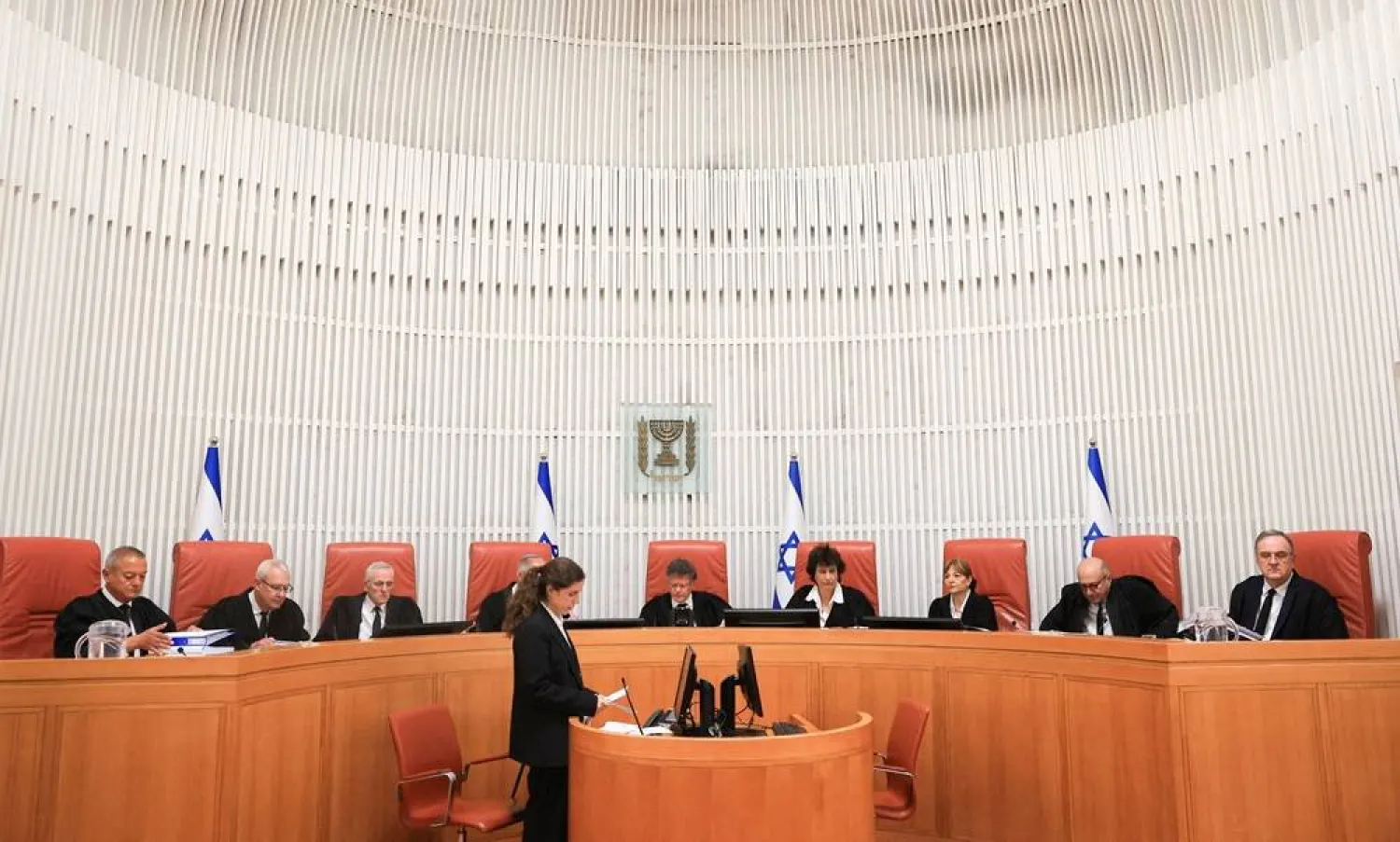 Israeli Supreme Court judges assemble on the day of the hearing for a petition to force Israeli Prime Minister Benjamin Netanyahu to oust Israeli National Security Minister Itamar Ben-Gvir from his position, following allegations Ben-Gvir used his role to intervene in investigations and operational matters, at the Supreme Court in Jerusalem April 15, 2026. (Reuters) 