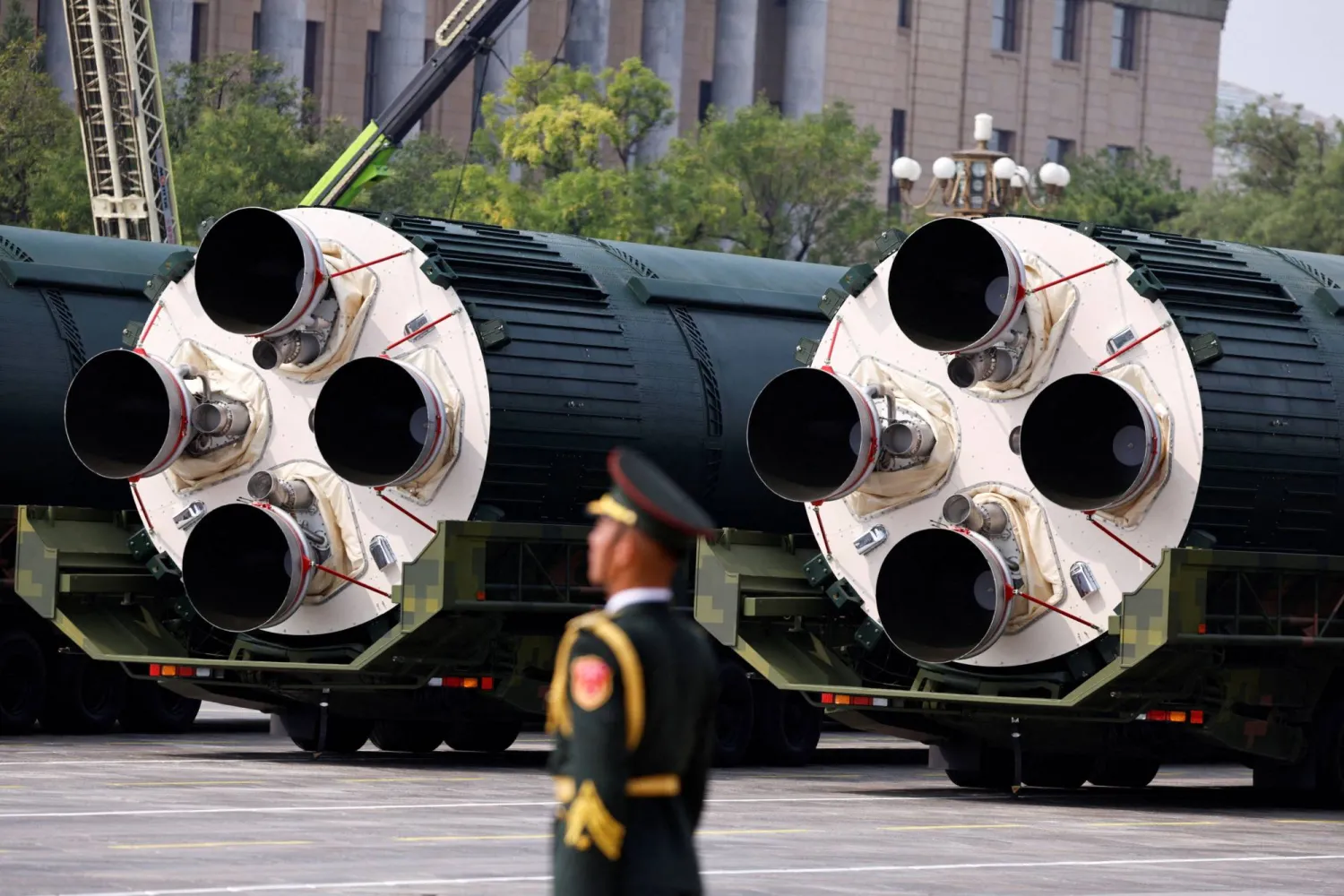 FILE PHOTO: A member of the People's Liberation Army stands as the strategic strike group displays DF-5C nuclear missiles during a military parade to mark the 80th anniversary of the end of World War Two, in Beijing, China, September 3, 2025. REUTERS/Tingshu Wang/File Photo