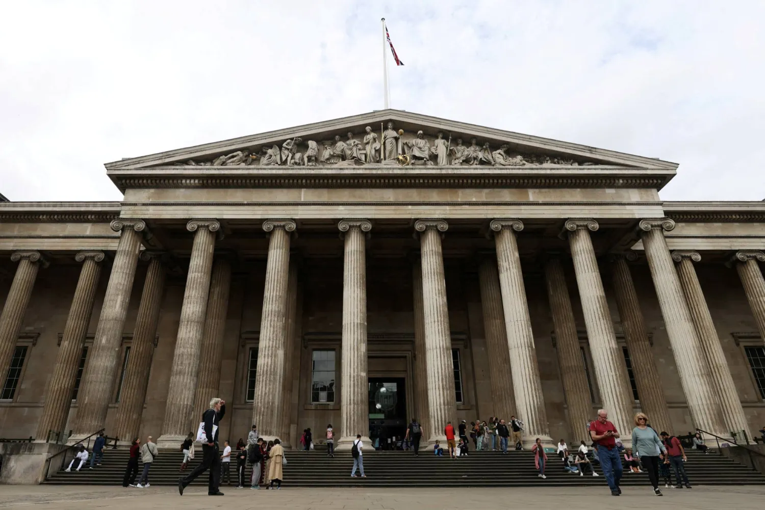 FILE PHOTO: People walk in front of the British Museum in London, Britain, September 28, 2023. REUTERS/Hollie Adams/File Photo