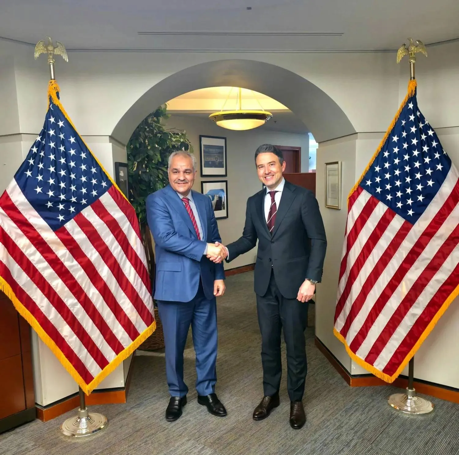 Libya central bank governor (left) with US assistant secretary of state (central bank)