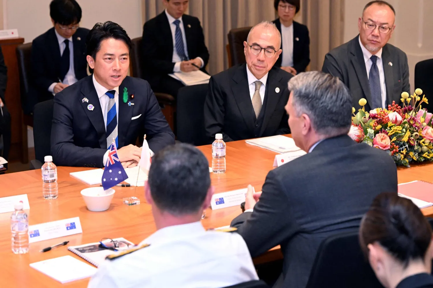 Australia's Deputy Prime Minister and Minister for Defense Richard Marles (R) listens to Japan's Minister of Defense Koizumi Shinjiro (L) during a Defense Ministers' Meeting at the Commonwealth Parliament Offices in Melbourne on April 18, 2026. (Photo by William WEST / AFP)