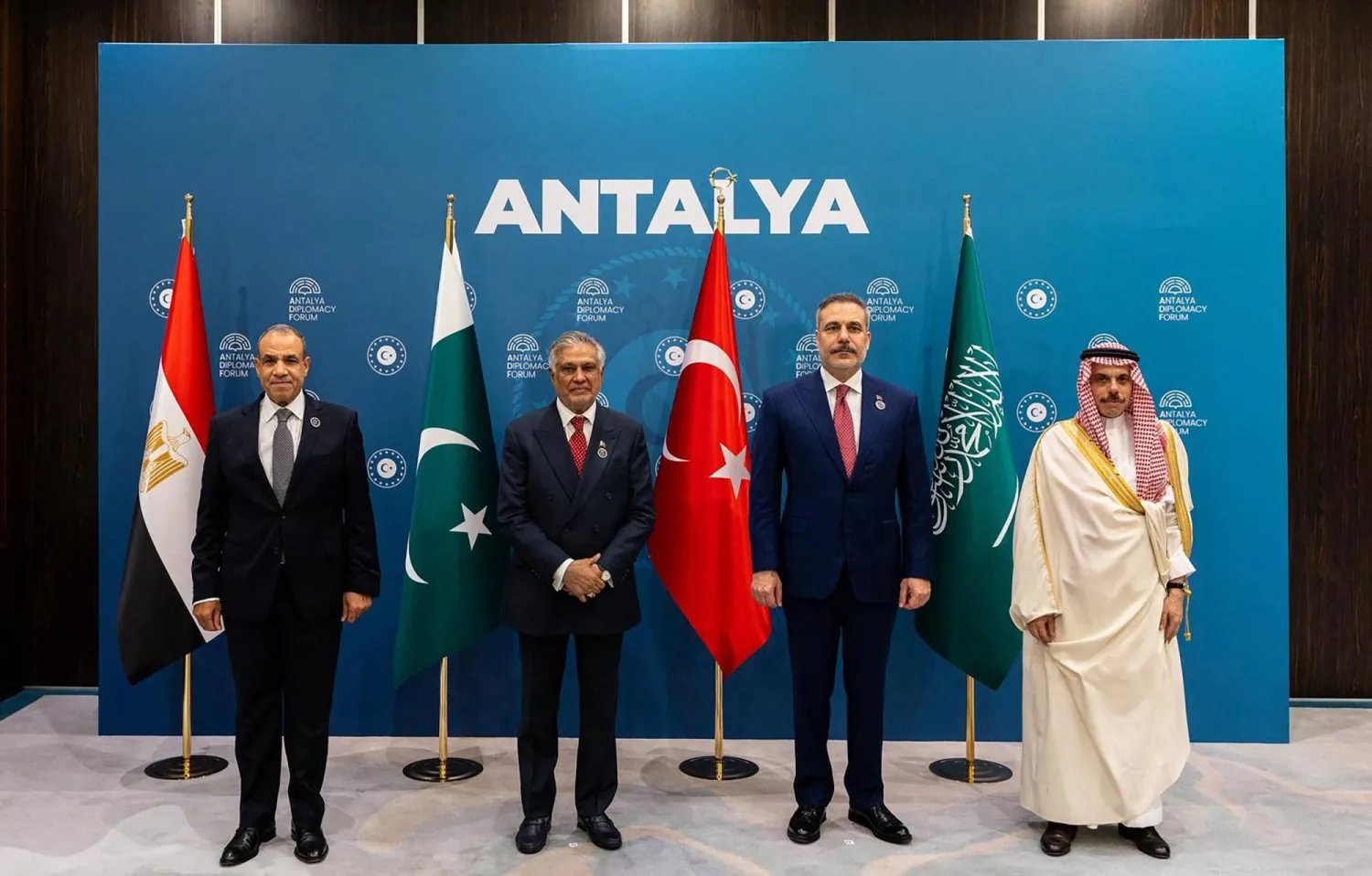 This handout photograph taken and released by Turkish Foreign Ministry on April 17, 2026, shows Türkiye's Foreign Minister Hakan Fidan (2nd R), Saudi Arabia's Foreign Minister Faisal bin Farhan Al-Saud (R), Egyptian counterpart Badr Abdelatty (L) and Pakistan's Foreign Minister Ishaq Dar (2nd L) poses family photo during the 5th edition of the Antalya Diplomacy Forum (ADF2026) in Antalya. (Photo by Turkish Foreign Ministery Press Service / TURKISH FOREIGN MINISTRY / AFP) CLIENTS