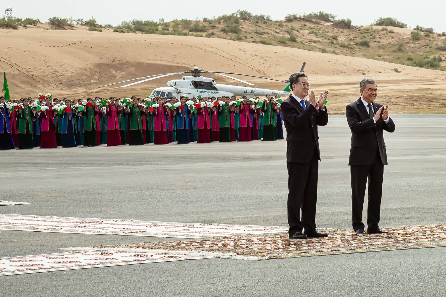 Former Turkmen president Gurbanguly Berdymukhamedov and Chinese Vice Premier Ding Xuexiang applaud during a ceremony launching the fourth of seven planned development phases at Galkynysh gas field, the world's second-largest gas field in the Karakum desert about 400 kilometres (250 miles) east of the capital Ashgabat, on April 17, 2026. (Photo by AFP)