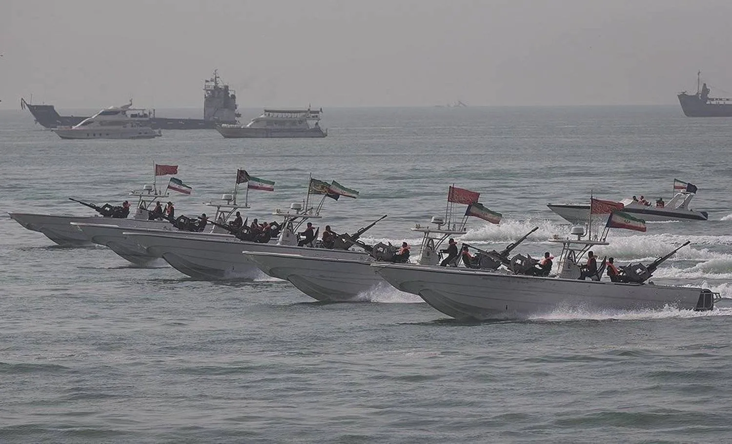 Revolutionary Guard speedboats are seen during maneuvers in the Strait of Hormuz. (Tasnim) 