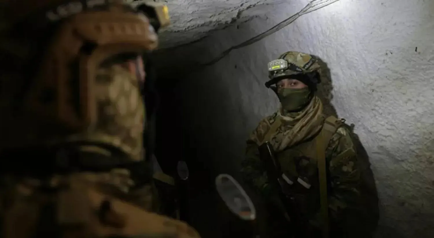  Syrian soldiers inspect a tunnel on the Lebanon border in the Qusayr area. (AFP)