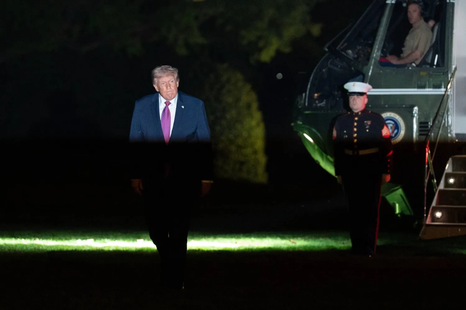  President Donald Trump walks on the South Lawn upon his arrival to the White House, Friday, April 17, 2026, in Washington. (AP) 